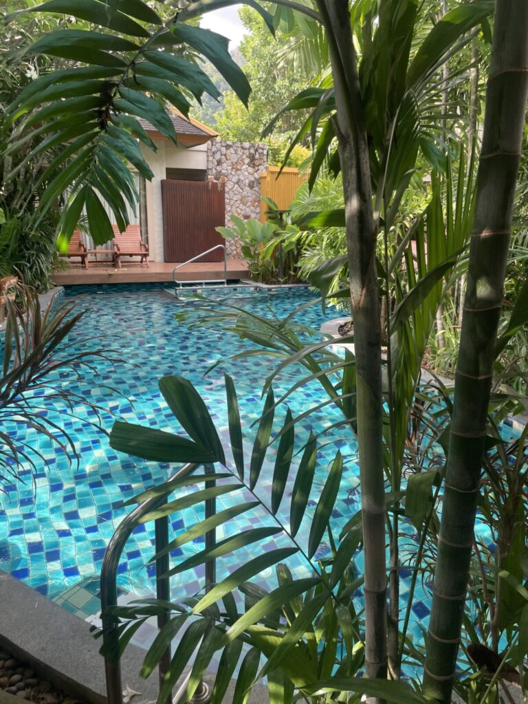 Metadee Concept Phuket Deluxe Twin Pool-Access — terrace with direct lagoon entry
Large bathroom with freestanding tub and rain shower at Metadee Concept Phuket
Lagoon-style pool canals outside the Deluxe Twin Pool-Access terrace
