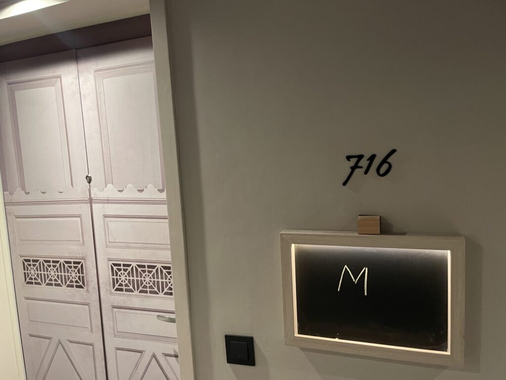 Hallway room signage with chalkboard nameplate at lyf Funan